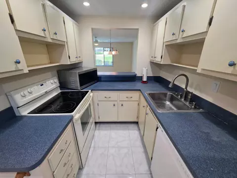 Kitchen - 5403 SE Miles Grant Rd #H108, Stuart, FL 34997 photo 3 of 5