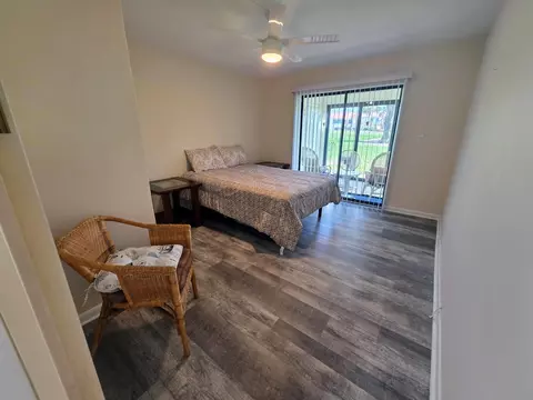 Bedroom - 5403 SE Miles Grant Rd #H108, Stuart, FL 34997 photo 7 of 9