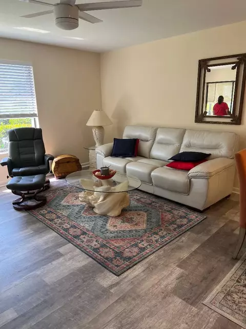 Living - 5403 SE Miles Grant Rd #H108, Stuart, FL 34997 photo 6 of 7