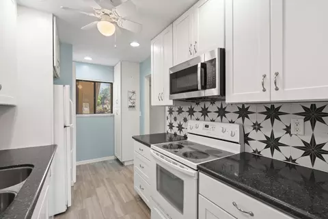 Kitchen - 5373 SE Miles Grant Rd #C-105, Stuart, FL 34997 photo 3 of 3
