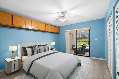 Bedroom - 5373 SE Miles Grant Rd #C-105, Stuart, FL 34997 photo 2 of 6