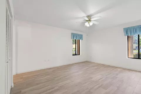 Bedroom - 5373 SE Miles Grant Rd #C-105, Stuart, FL 34997 photo 6 of 6