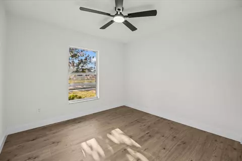 Bedroom - 945 SE Forrest Park Dr, Stuart, FL 34994 photo 3 of 8