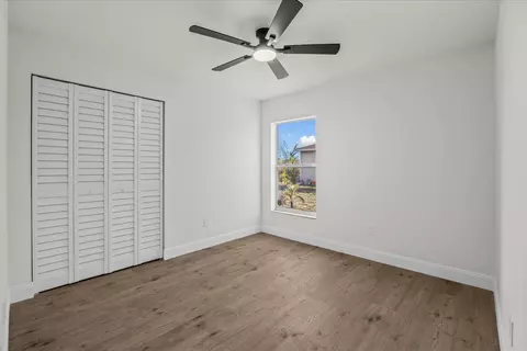 Bedroom - 945 SE Forrest Park Dr, Stuart, FL 34994 photo 2 of 8
