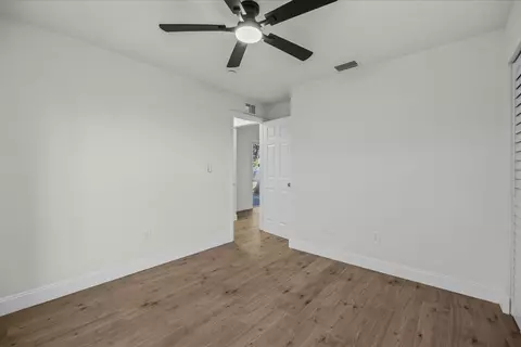 Bedroom - 945 SE Forrest Park Dr, Stuart, FL 34994 photo 1 of 8