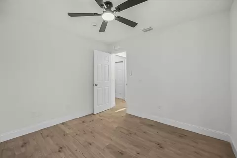 Bedroom - 945 SE Forrest Park Dr, Stuart, FL 34994 photo 8 of 8