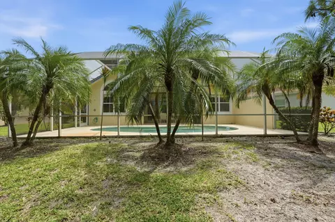 Exterior - 6483 SE Wild Olive Ln, Stuart, FL 34997 photo 6 of 14