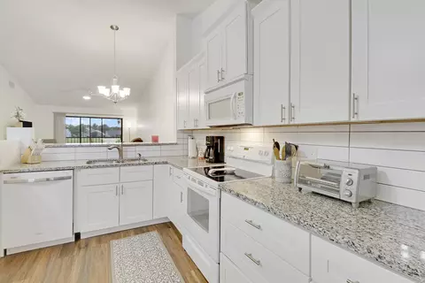 Kitchen - 1112 Keystone Dr N #A, Jupiter, FL 33458 photo 6 of 7