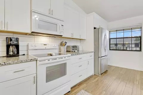 Kitchen - 1112 Keystone Dr N #A, Jupiter, FL 33458 photo 5 of 7