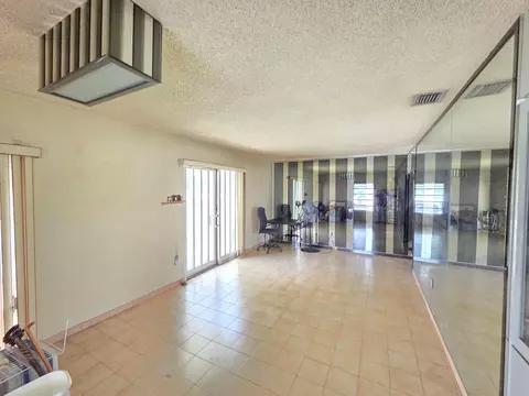 Living - 6495 W 2nd Ct, Hialeah, FL 33012 photo 2 of 2