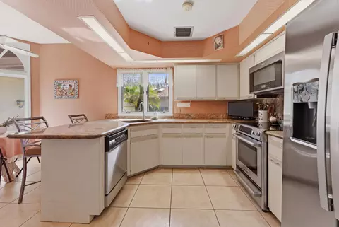 Kitchen - 5370 SE Merion Way, Stuart, FL 34997 photo 1 of 2