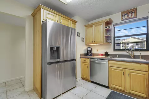 Kitchen - 3061 SE Aster Ln #302, Stuart, FL 34994 photo 5 of 5