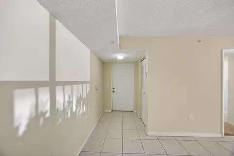 Entry Way - 3844 Lyons Rd #101-4, Coconut Creek, FL 33073 photo 2 of 4