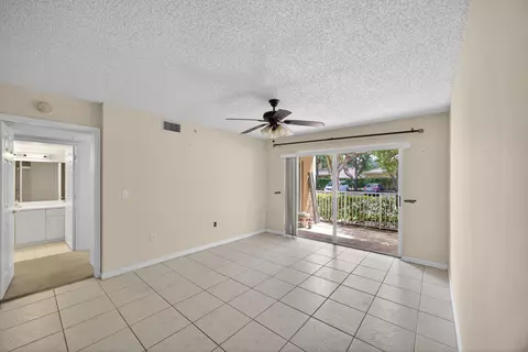 Living - 3844 Lyons Rd #101-4, Coconut Creek, FL 33073 photo 3 of 4