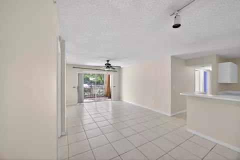 Living - 3844 Lyons Rd #101-4, Coconut Creek, FL 33073 photo 2 of 4