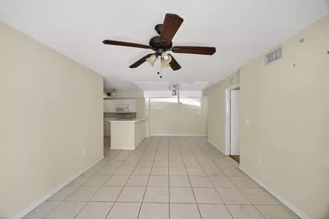 Living - 3844 Lyons Rd #101-4, Coconut Creek, FL 33073 photo 4 of 4