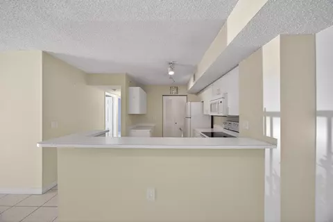Kitchen - 3844 Lyons Rd #101-4, Coconut Creek, FL 33073 photo 1 of 3