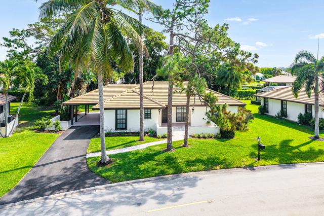 433 Pine Villa Dr, Atlantis, FL 33462
