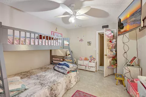 Bedroom - 5852 SE Riverboat Dr #321, Stuart, FL 34997 photo 4 of 5