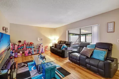 Living - 5852 SE Riverboat Dr #321, Stuart, FL 34997 photo 3 of 4
