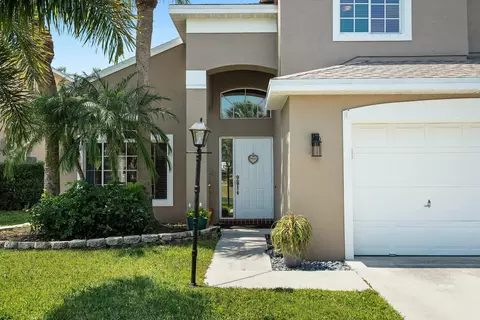 Exterior - 2480 SE Springtree Pl, Stuart, FL 34997 photo 3 of 8