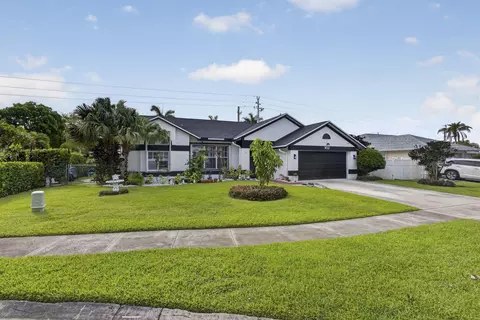 102 E Royal Pine Cir Ct, Royal Palm Beach, FL 33411