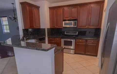 Kitchen - 103 E Thatch Palm Cir, Jupiter, FL 33458 photo 2 of 2