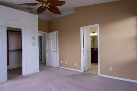 Bedroom - 103 E Thatch Palm Cir, Jupiter, FL 33458 photo 2 of 4