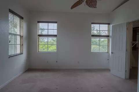 Bedroom - 103 E Thatch Palm Cir, Jupiter, FL 33458 photo 1 of 4