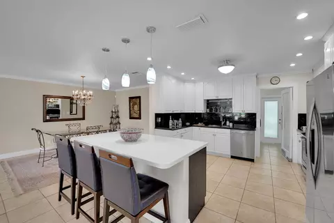 Kitchen - 1019 E Cypress Dr, Pompano Beach, FL 33069 photo 1 of 15