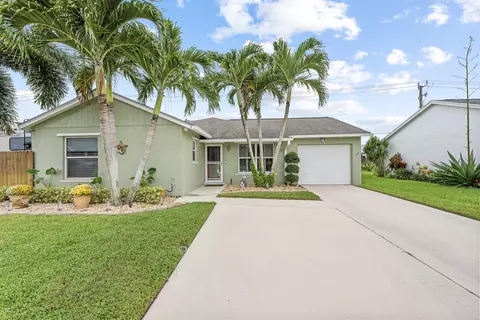 Exterior - 128 Banyan Cir, Jupiter, FL 33458 photo 11 of 12