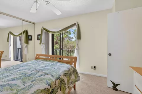 Bedroom - 5706 SE Riverboat Dr #202, Stuart, FL 34997 photo 2 of 5