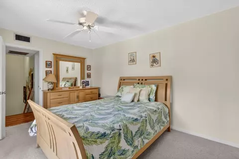 Bedroom - 5706 SE Riverboat Dr #202, Stuart, FL 34997 photo 3 of 5