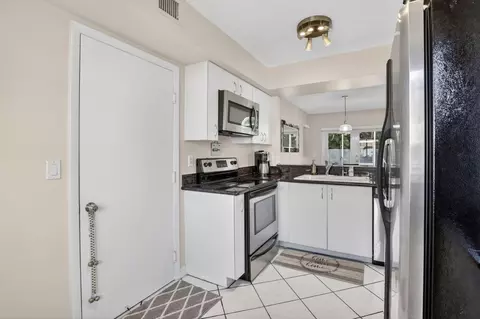 Kitchen - 1306 SE 5th Ct, Dania Beach, FL 33004 photo 4 of 5