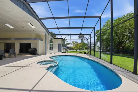 Exterior - 4599 SE Halston Ct, Stuart, FL 34997 photo 5 of 10
