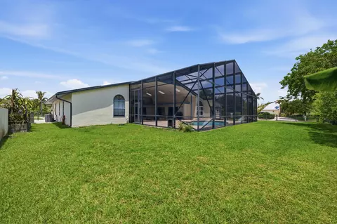 Exterior - 4599 SE Halston Ct, Stuart, FL 34997 photo 9 of 10