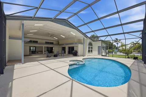 Exterior - 4599 SE Halston Ct, Stuart, FL 34997 photo 6 of 10