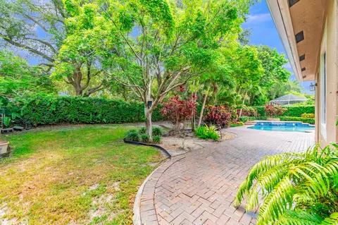 Exterior - 5718 NW 50th Dr, Coral Springs, FL 33067 photo 11 of 13