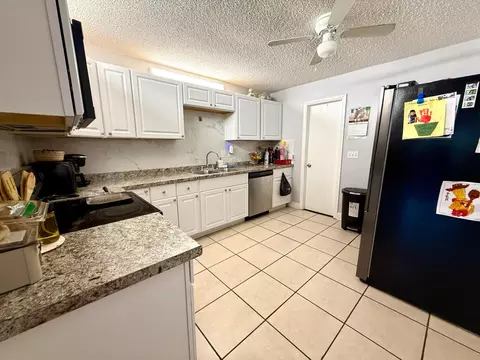 Kitchen - 4441-4443 SE Village Rd, Stuart, FL 34997 photo 3 of 3