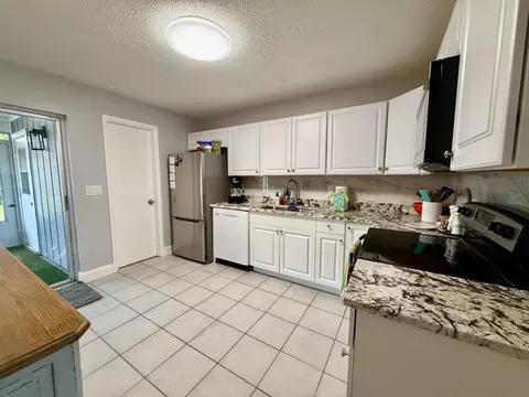 Kitchen - 4441-4443 SE Village Rd, Stuart, FL 34997 photo 2 of 3