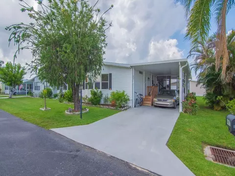 Exterior - 4697 SE Copperwood Ter, Stuart, FL 34997 photo 2 of 8