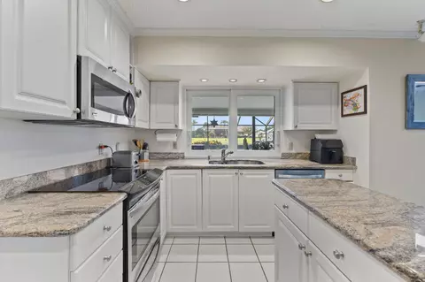 Kitchen - 3374 SE Fairway E, Stuart, FL 34997 photo 1 of 3