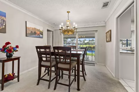 Dining - 3374 SE Fairway E, Stuart, FL 34997 photo 2 of 2
