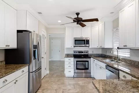 Kitchen - 911 NW Sunset Ter, Stuart, FL 34994 photo 1 of 3