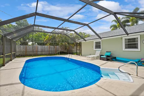 Exterior - 4796 SE Manatee Ter, Stuart, FL 34997 photo 9 of 15