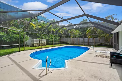 Exterior - 4796 SE Manatee Ter, Stuart, FL 34997 photo 8 of 15