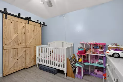 Bedroom - 6258 Chasewood Dr #G, Jupiter, FL 33458 photo 2 of 3