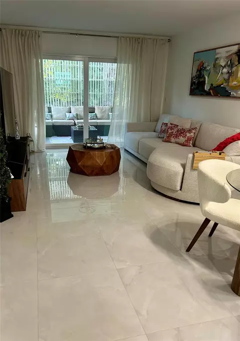 Living - 3060 Holiday Springs Blvd #102, Margate, FL 33063 photo 2 of 4