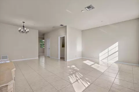 Living - 335 E Thatch Palm Cir #104, Jupiter, FL 33458 photo 2 of 3