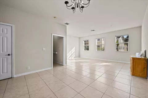 Living - 335 E Thatch Palm Cir #104, Jupiter, FL 33458 photo 1 of 3